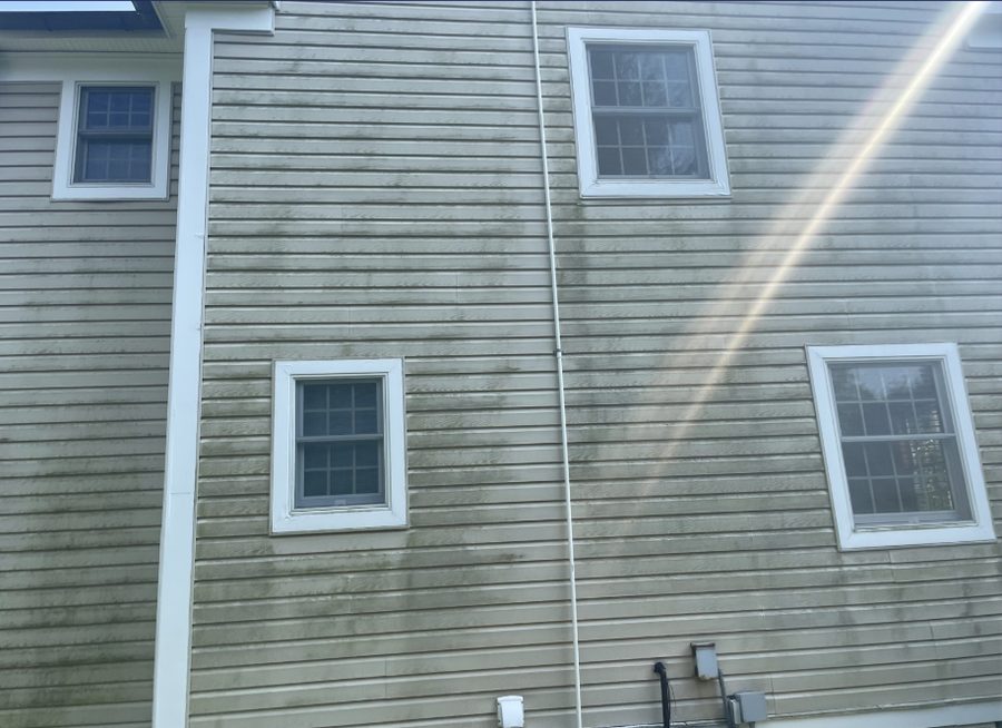 House siding before power washing