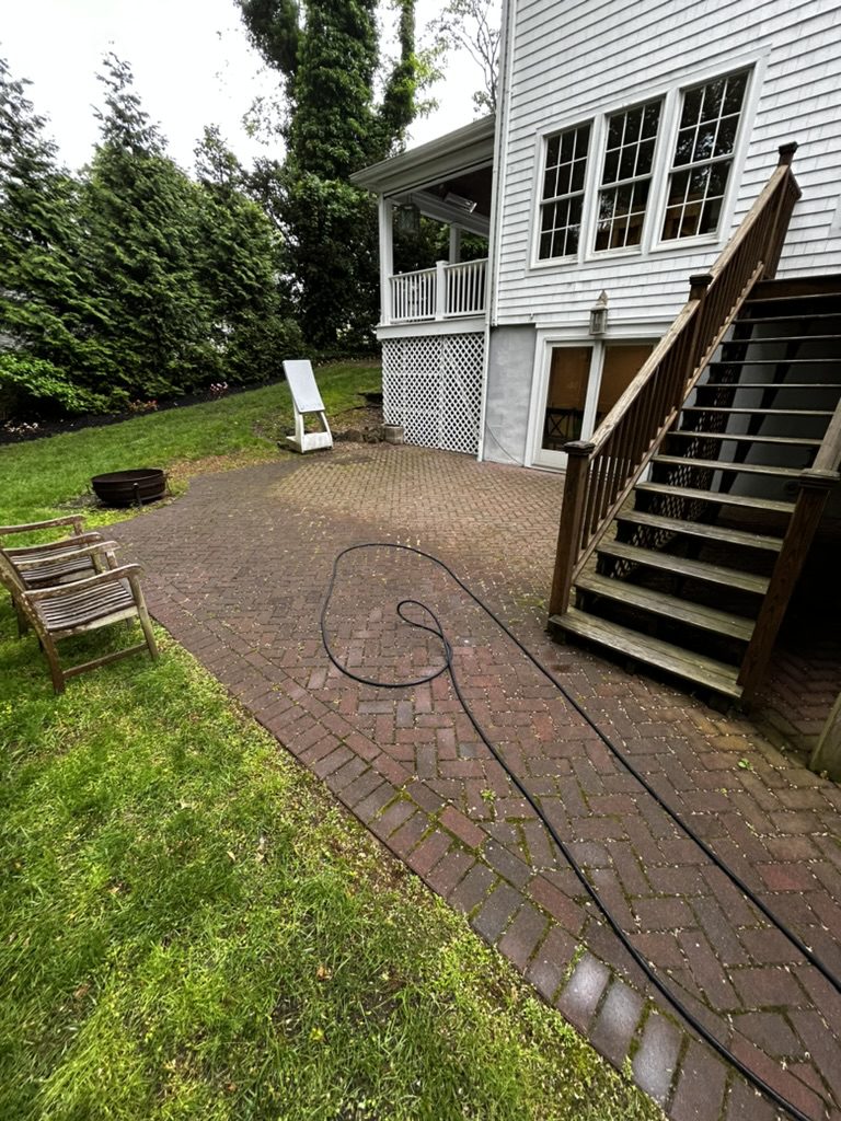 Herringbone paver patio before cleaning